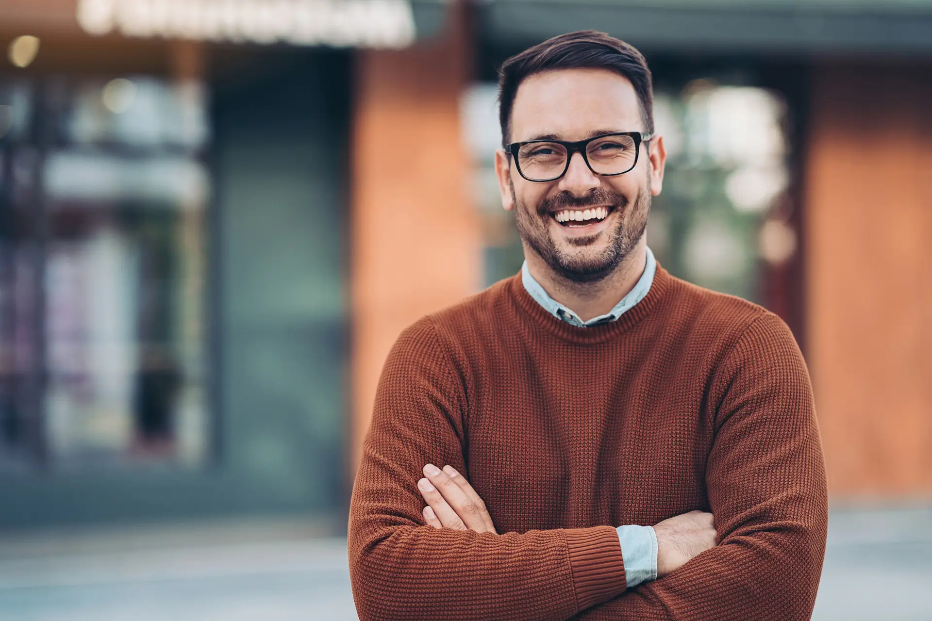 Smiling patient after tooth-coloured filling treatment at Olympic Park Smiles Dental in Calgary