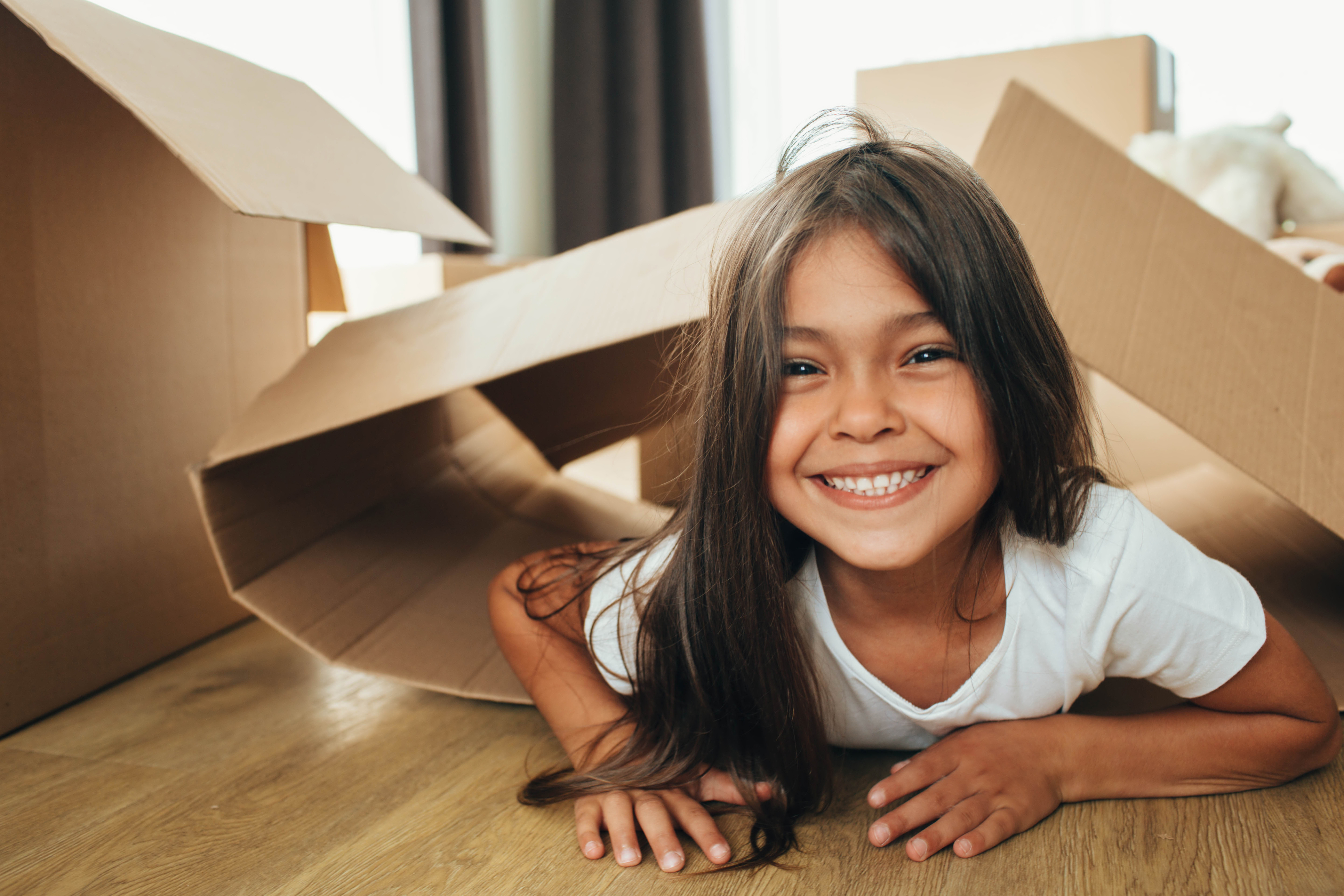 Smiling child after a preventive dental visit at Olympic Park Smiles Dental in Calgary